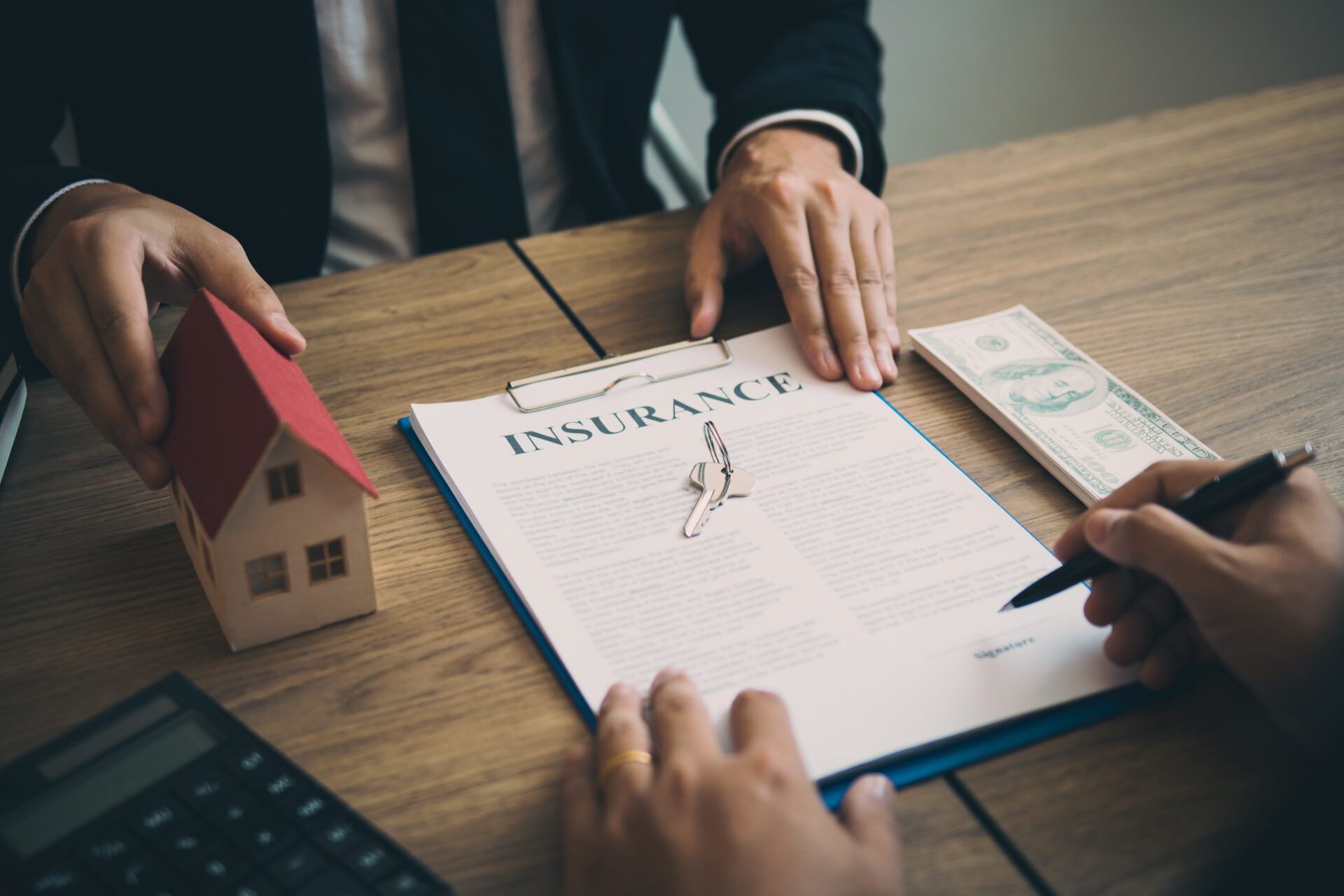 Real estate agent discussion about signing on paper financial co Real estate agent discussion about signing on paper financial co